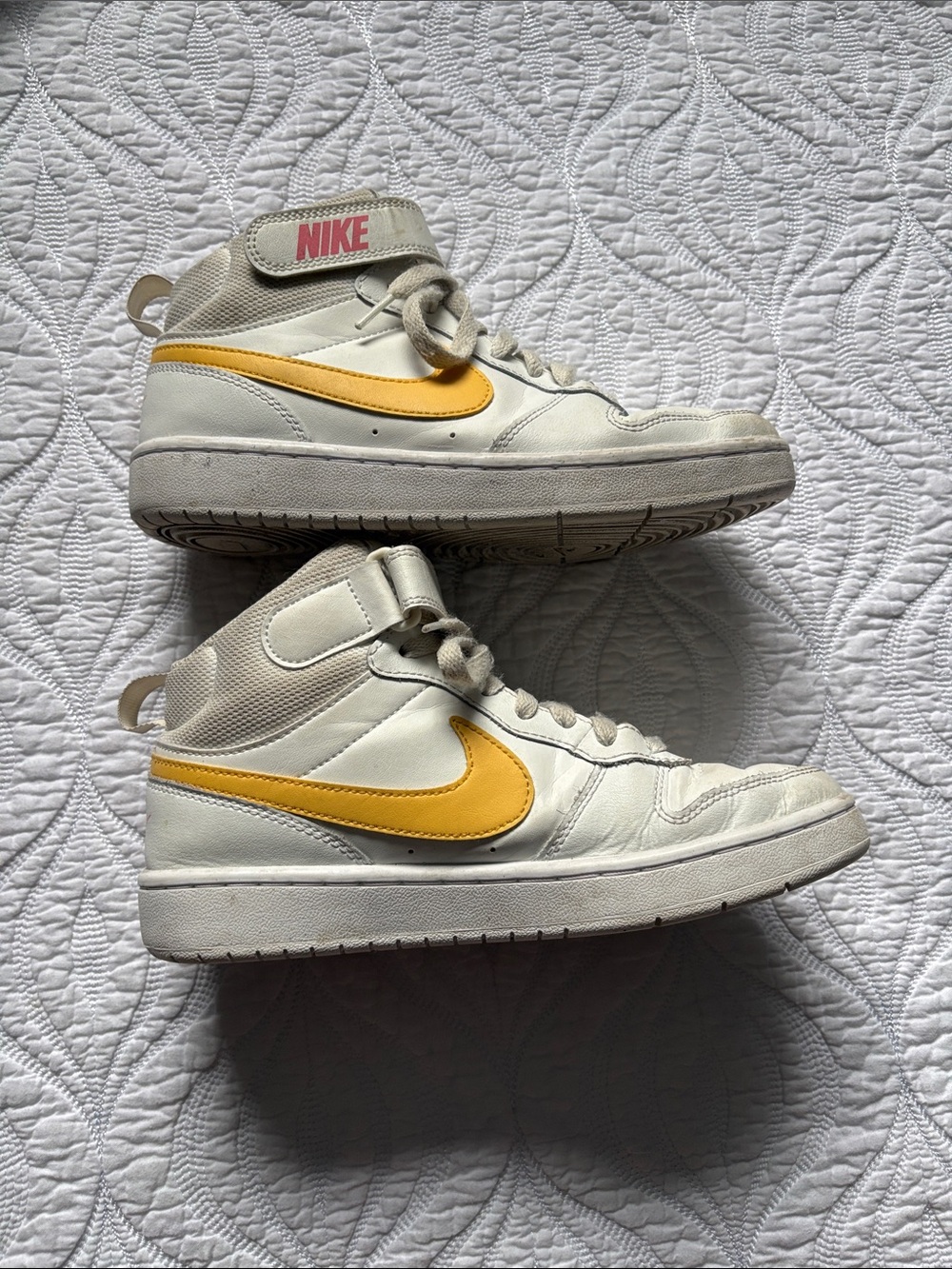 Nike Women’s High-Top Sneakers in White with Yellow Swoosh
